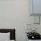 Comfort Studio at Green Pramuka City Apartment near Shopping Center By Travelio