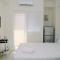 Comfort Studio at Green Pramuka City Apartment near Shopping Center By Travelio
