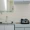 Comfort Studio at Green Pramuka City Apartment near Shopping Center By Travelio