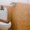Comfort Studio at Green Pramuka City Apartment near Shopping Center By Travelio