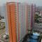Comfort Studio at Green Pramuka City Apartment near Shopping Center By Travelio