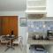 Flat Apartamento Próximo a Praia Com Vista Mar e Lagoa - Cozinha e Frigobar - American Flat - 圣路易斯