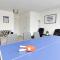 Spacious 4-Bedroom House with POOL & TABLE TENNIS TABLE and MASSAGE CHAIRS By Your Lettings Short Lets & Serviced Accommodation Peterborough Free WiFi and Netflix