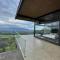 KALAI- Escapada de lujo elegante loft con impresionante vista al valle y proximidad al aeropuerto - Alajuela