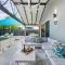 A Sumptuous Poolside Family Oasis at Gardens Villa