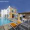 BLUE CORAL BEACH VILLAS three exclusive villas - Poseidon - Nautilus - Oceanos - and - Baby Coral bungalow