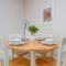 Modern Flat with Balcony next to Station by CTO Serviced Accommodation - London
