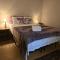 Entire 2-bedroom, 2 bath home with parking and newly renovated floors