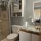 Entire 2-bedroom, 2 bath home with parking and newly renovated floors