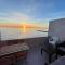 Sunrise Beachfront Studio with Mezzanine - Gibilterra