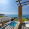 BLUE CORAL BEACH VILLAS three exclusive villas - Poseidon - Nautilus - Oceanos - and - Baby Coral bungalow