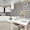 Nowoczesny Apartament Blisko Rzeki we Wrocławiu z Biurkiem i Parkingiem by Noclegi Renters - Вроцлав