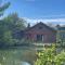 Chalet au bord d'un étang - Ueberstrass