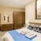 TaSiku Gozitan villa Pool & hot tub - Happy Rentals
