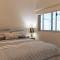 Luxury beachfront apartment at The Breeze - Free Wifi