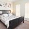 4 BR Home with Garage- short walk to shops, cafe, dining, and supermarkets