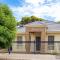 4 BR Home with Garage- short walk to shops, cafe, dining, and supermarkets