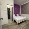 Lavender Theme Walk Up Apartment Matang - Kučing