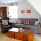 Neuerbautes Haus im Friesenstil. Moderne 2-Zimmer-Appartements mit Balkon für bis zu 4 Personen