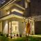 Golf View Home by StayJade, 4BHK, Projector - 霍苏尔