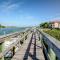 Pet Friendly Bouchelle Island Condo! Walk out sliders to the Pool - BO302 - 103 - نيو سميرنا بيتش