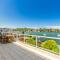 Stunning waterfront townhouse with shared swimpool, harbour view and free P