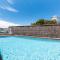Stunning waterfront townhouse with shared swimpool, harbour view and free P