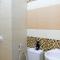 Best Value 1BR at Twin Tower Apartment By Travelio - 泗水