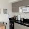 Flat Moderno c Nespresso, Alexa e Internet 600Gb - 圣洛伦索