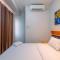 Stylish and Comfy 2BR at Transpark Cibubur Apartment By Travelio