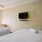 Cozy and Homey Studio Great Western Resort Apartment By Travelio