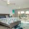 Beachfront - Garden Delight 3BR condo - E125 - شاطئ بالم إيغل