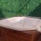 Casa com Jacuzzi e churrasqueira individual - 伊塔尼亚恩