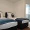 Apartments Seibel Doppel-Zweibettzimmer mit Bad - 罗伊特林根