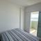 Apartamento Novo Frente ao Mar Com piscina no Centro de Itanhaém - 伊塔尼亚恩