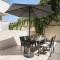 Urban Oasis with Patio for 5 guests - reserved parking - Termini - Rzym