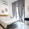 Urban Oasis with Patio for 5 guests - reserved parking - Termini - Rzym