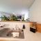 Cozy 2-Bedroom Guest Suite surrounded by garden near Lake with Free parking and Wi-Fi