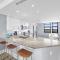 Elegant beachfront condo in private community