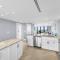 Elegant beachfront condo in private community