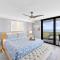 Elegant beachfront condo in private community