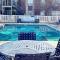 Charming Stay with Pool and Dedicated Workspace