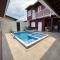 Casa no Centro de Bertioga com Piscina