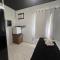 Suite 1- em Praia bonita hospedagem agora com ar condicionado - 南圣弗朗西斯科