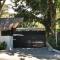Casa Remy - Walk to the Beach and stay in a private compound! Pool, Kitchen, AC, Wi-Fi