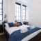 Spacious Designer Warehouse Melbourne CBD Apartment