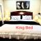 Cozy Walkout suite with King bed, Kitchen, Parking & Patio