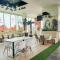 Homey and Warm Studio Amazana Serpong Apartment By Travelio - 当格浪