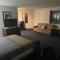 Apm Inn & Suites