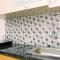 Cozy Studio at Urbantown Serpong Apartment By Travelio